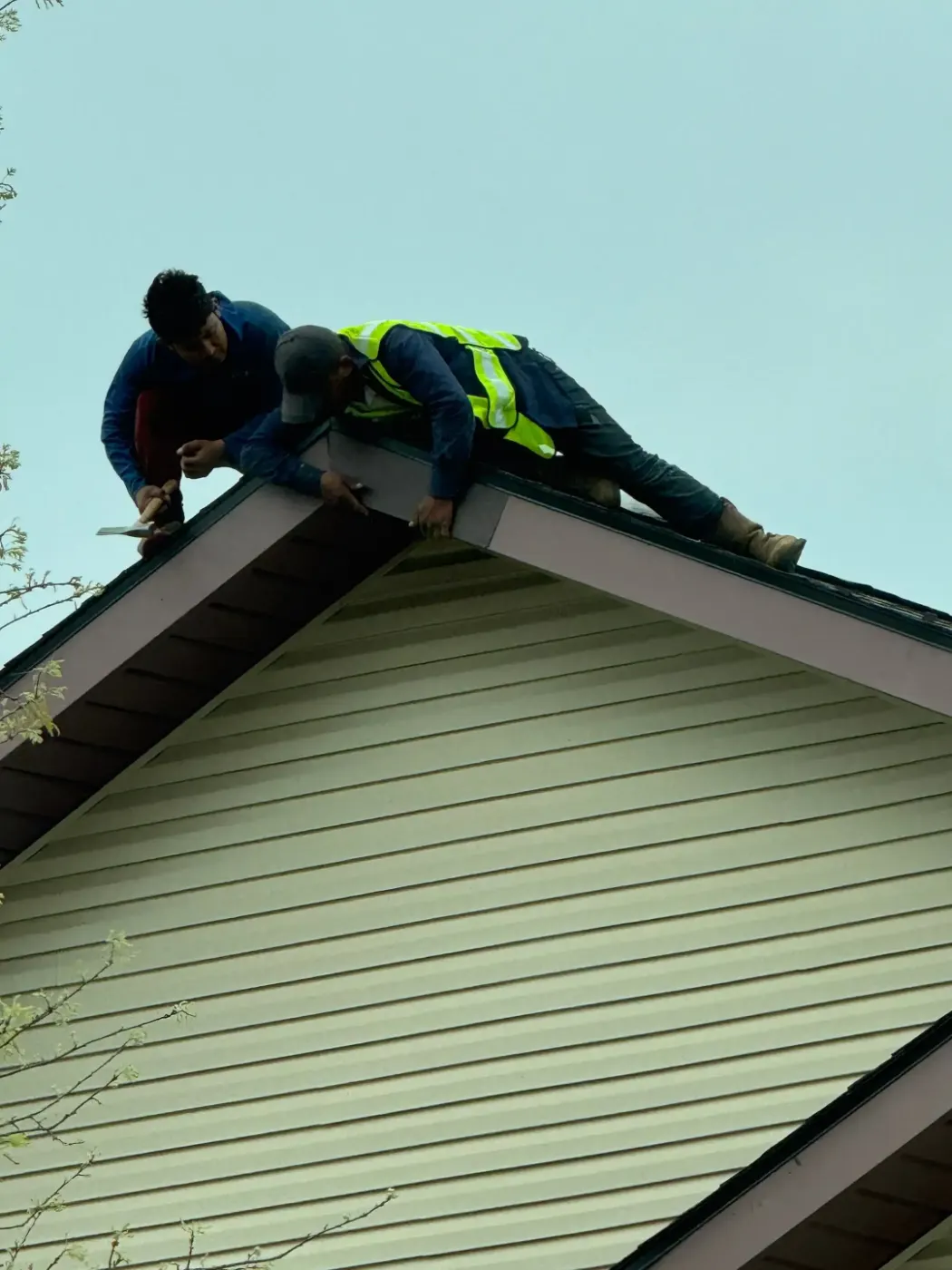 Tarping and dry-in on a Geist commercial roof